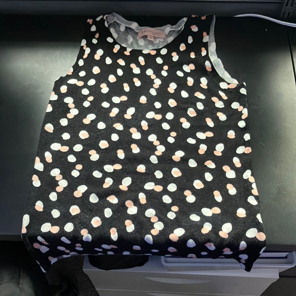 black patterned sweater vest